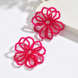 🌸 Boucles d’oreilles florales ajourées en perles