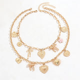 💛 Collier Bohème Superposé  – Cœur, Soleil & Nœuds Dorés 2 pièces