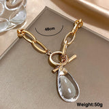 💛 Collier Vintage Goutte d’Eau en Acrylique – Chaîne Épaisse Dorée Tendance ✨