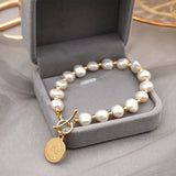 💖 Bracelet de luxe en perles d’eau douce ✨ – style baroque chic 🌸 acier inoxydable