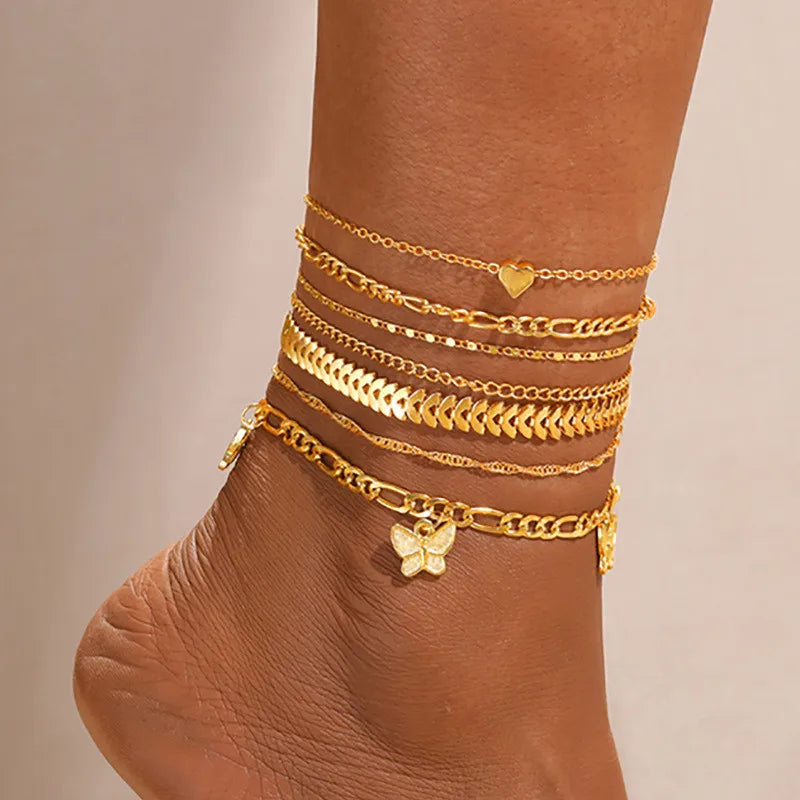 Ensemble de Bracelets de Cheville Multicouches 7 pièces – Papillon & Cœur Vintage Doré