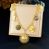 Collier Acier Inoxydable Doré – Fleur, Cœur & Soleil