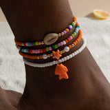 Bracelet de Cheville Bohème Multicouche – Coquillage & Étoile de Mer