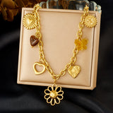 Collier Acier Inoxydable Doré – Fleur, Cœur & Soleil