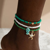 Bracelet de Cheville Bohème Multicouche – Coquillage & Étoile de Mer