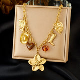 Collier Acier Inoxydable Doré – Fleur, Cœur & Soleil