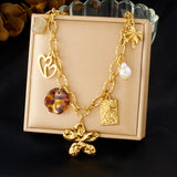 Collier Acier Inoxydable Doré – Fleur, Cœur & Soleil