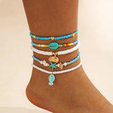 Bracelet de Cheville Bohème Multicouche – Coquillage & Étoile de Mer